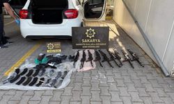 Kalaşnikoflarla yakalanan polis ve 2 kişi tutuklandı!