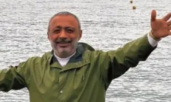 Ayağına ağırlık bağlayıp denize atladı!