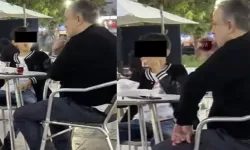 Ailesiyle sigara içen çocuğun görüntülerine tepki yağdı!