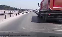 Kamyon otomobili önüne alıp metrelerce sürükledi